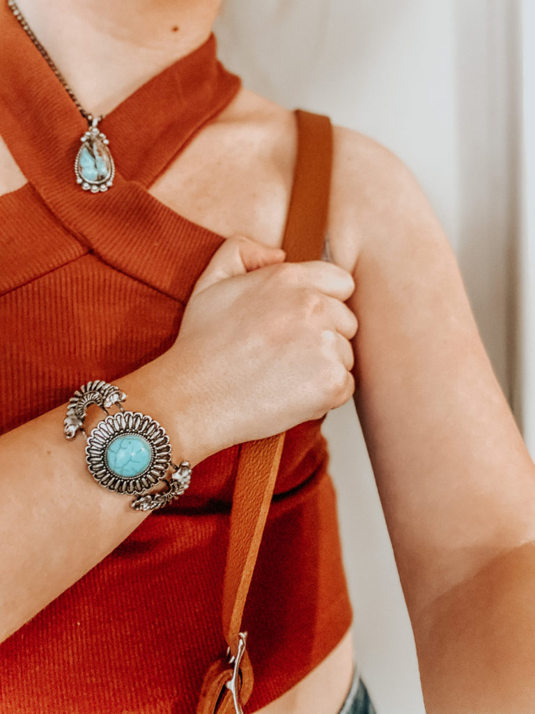 a turquoise jewelry bracelet  on a blonde girl (kiersten zile)
