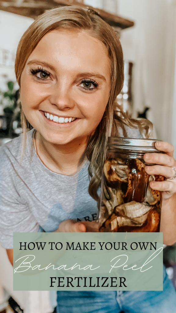 kiersten zile holding a mason jar of banana peel fertilizer with a shirt that says farming, food, and health are all interconnected