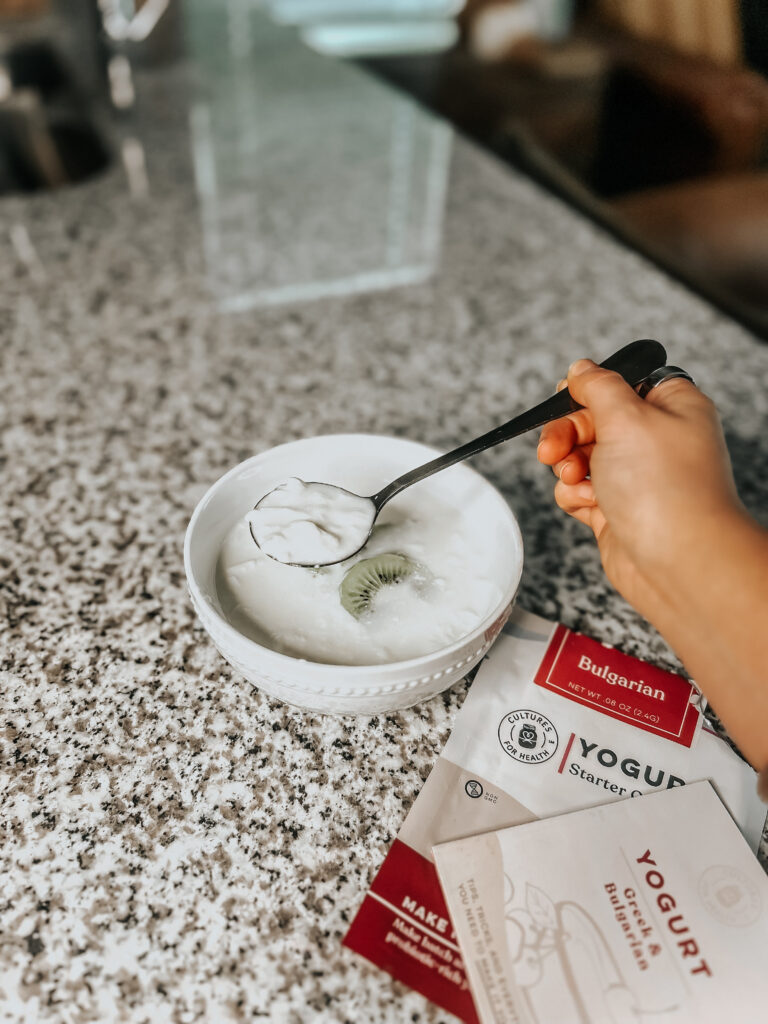 yogurt with kiwi as a garnish showing finished yogurt at home